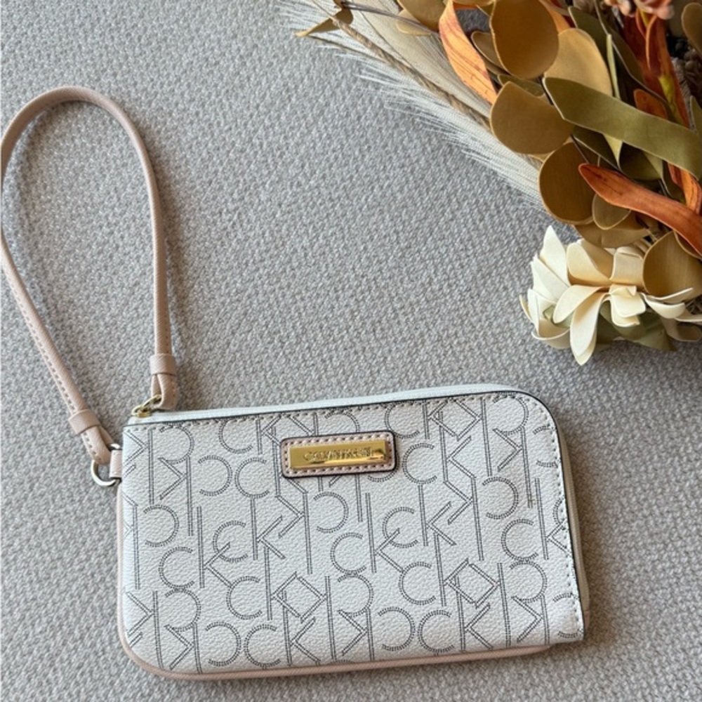 Calvin Klein Signature Pattern Wristlet in Cream and Tan